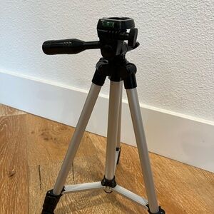 Compact Black and Silver Camera Tripod